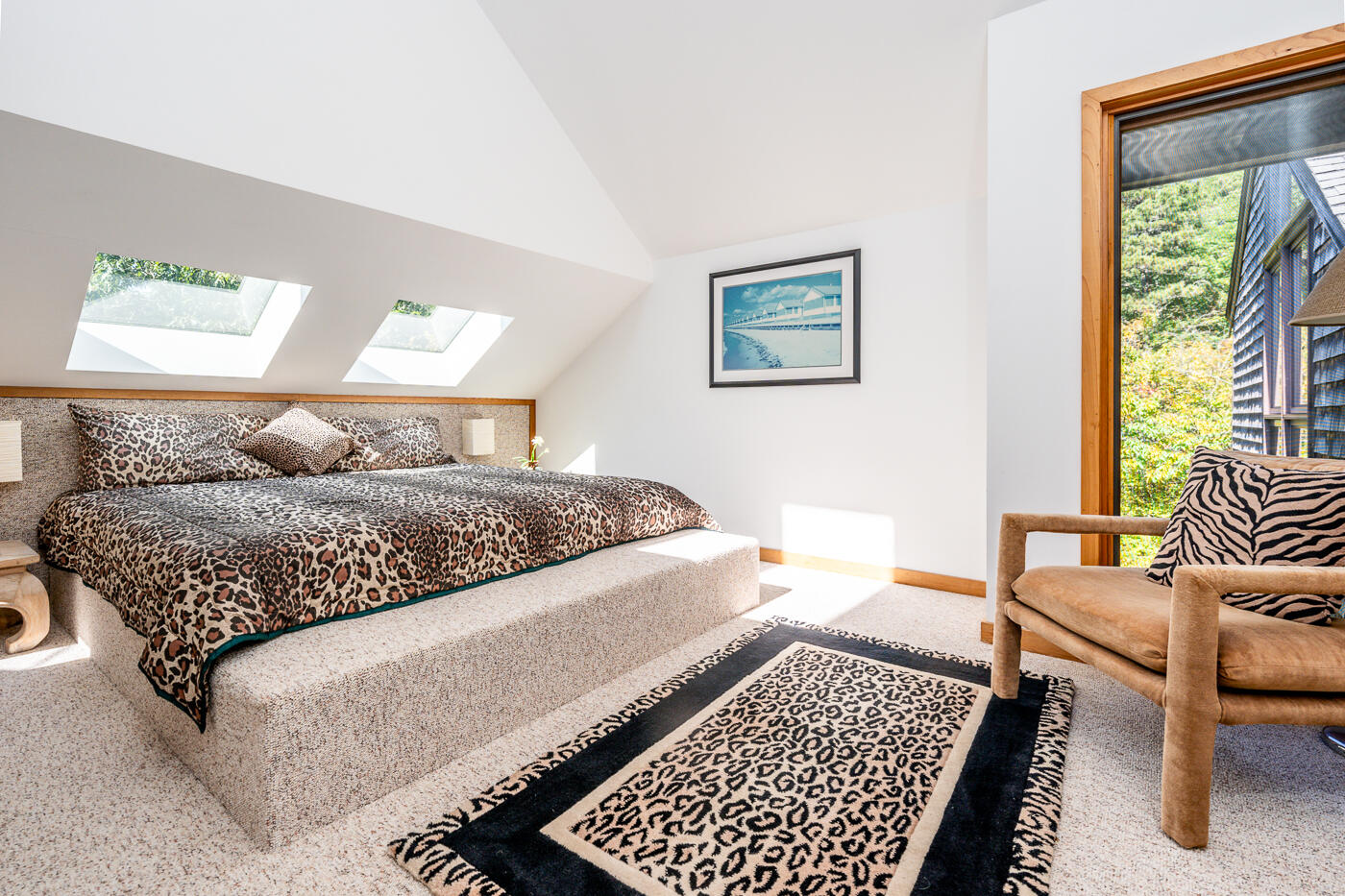256 Browns Neck Road Wellfleet, MA 02667 - Photo 27 of 66 a bedroom with a bed and wooden floor