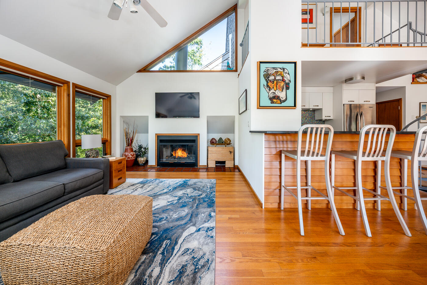 256 Browns Neck Road Wellfleet, MA 02667 - Photo 8 of 66 a living room with furniture fireplace and a flat screen tv