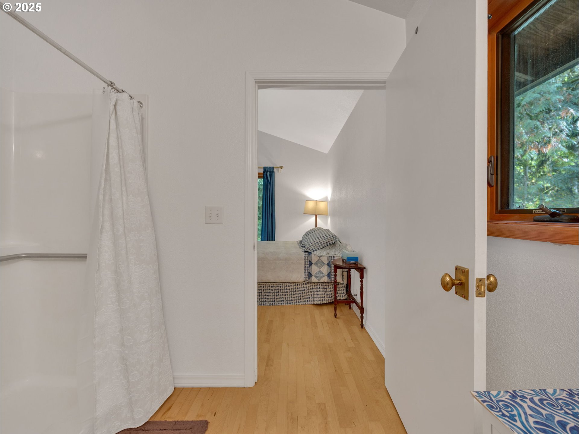 64079 East Barlow Trail Road Rhododendron, OR 97049 - Photo 21 of 48 a view of a room with wooden floor and furniture