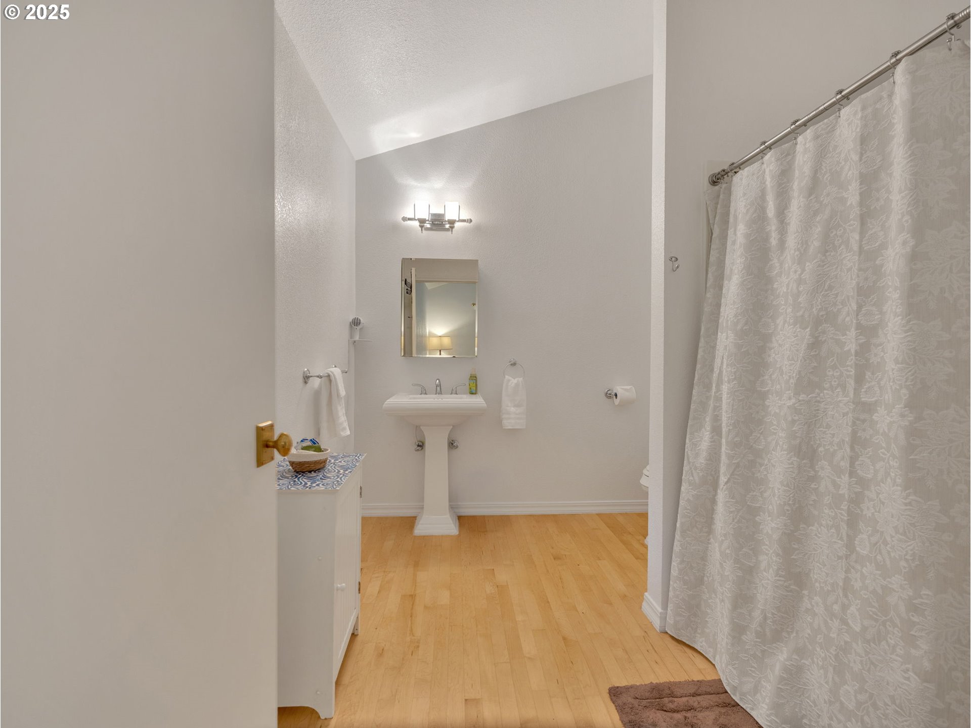 64079 East Barlow Trail Road Rhododendron, OR 97049 - Photo 22 of 48 a bathroom with a sink and mirror