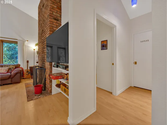 a view of a livingroom with furniture and storage