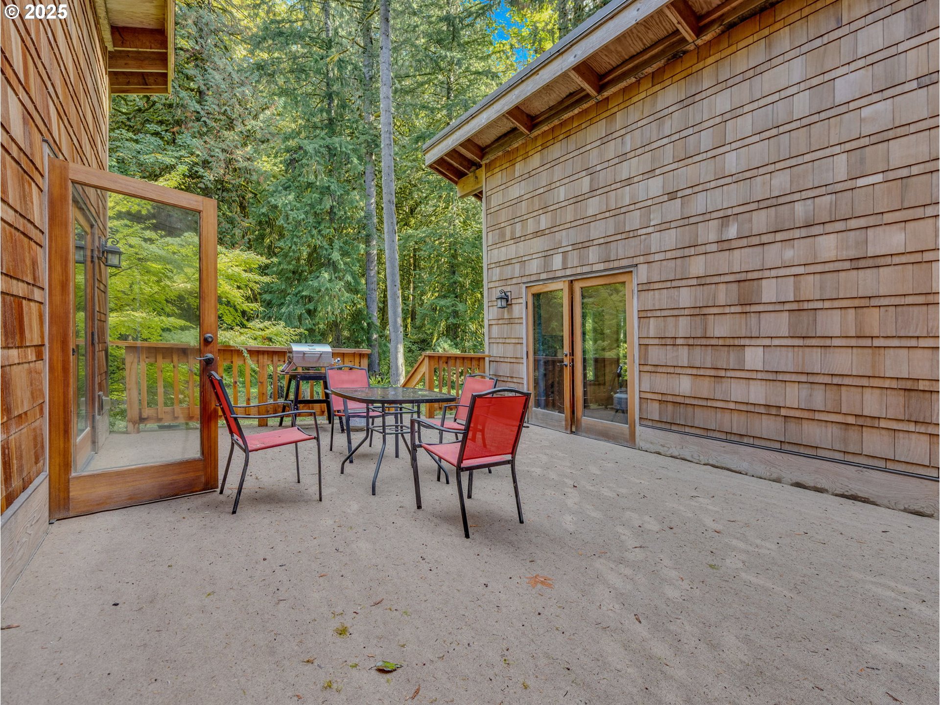 64079 East Barlow Trail Road Rhododendron, OR 97049 - Photo 41 of 48 a couple of chairs that are sitting in a backyard