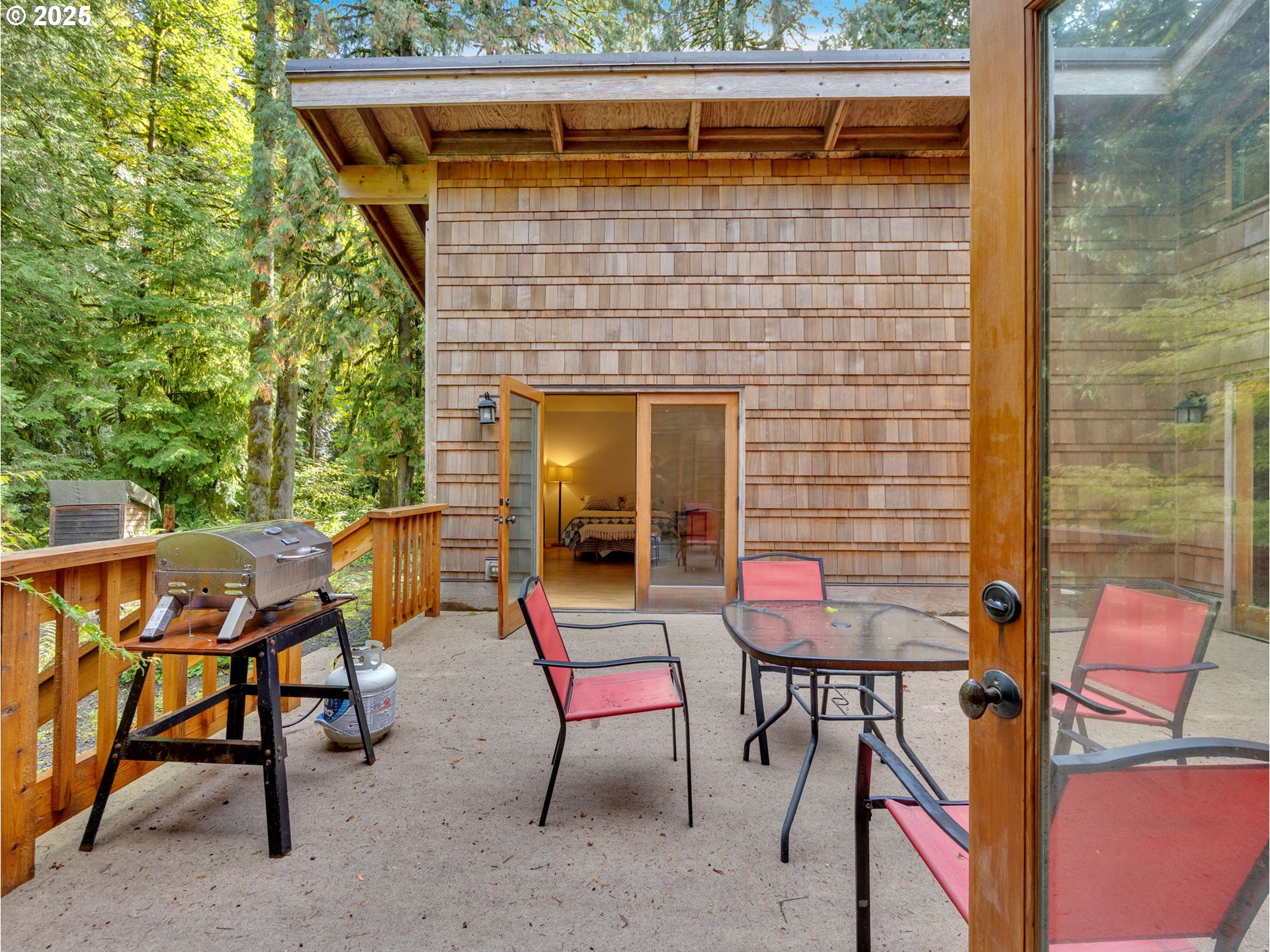 64079 East Barlow Trail Road Rhododendron, OR 97049 - Photo 43 of 48 a patio with table and chairs
