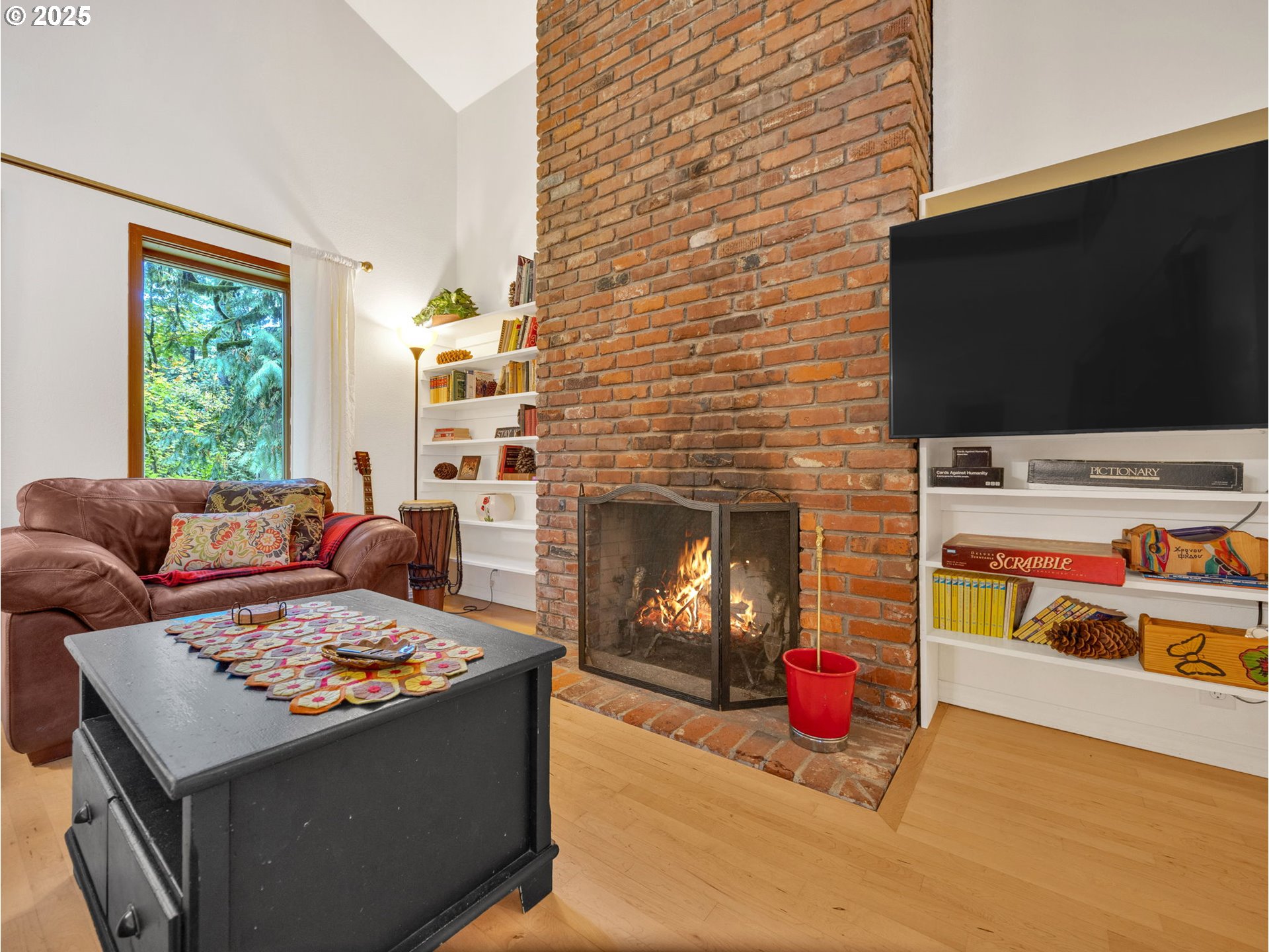 64079 East Barlow Trail Road Rhododendron, OR 97049 - Photo 7 of 48 a living room with furniture and a flat screen tv