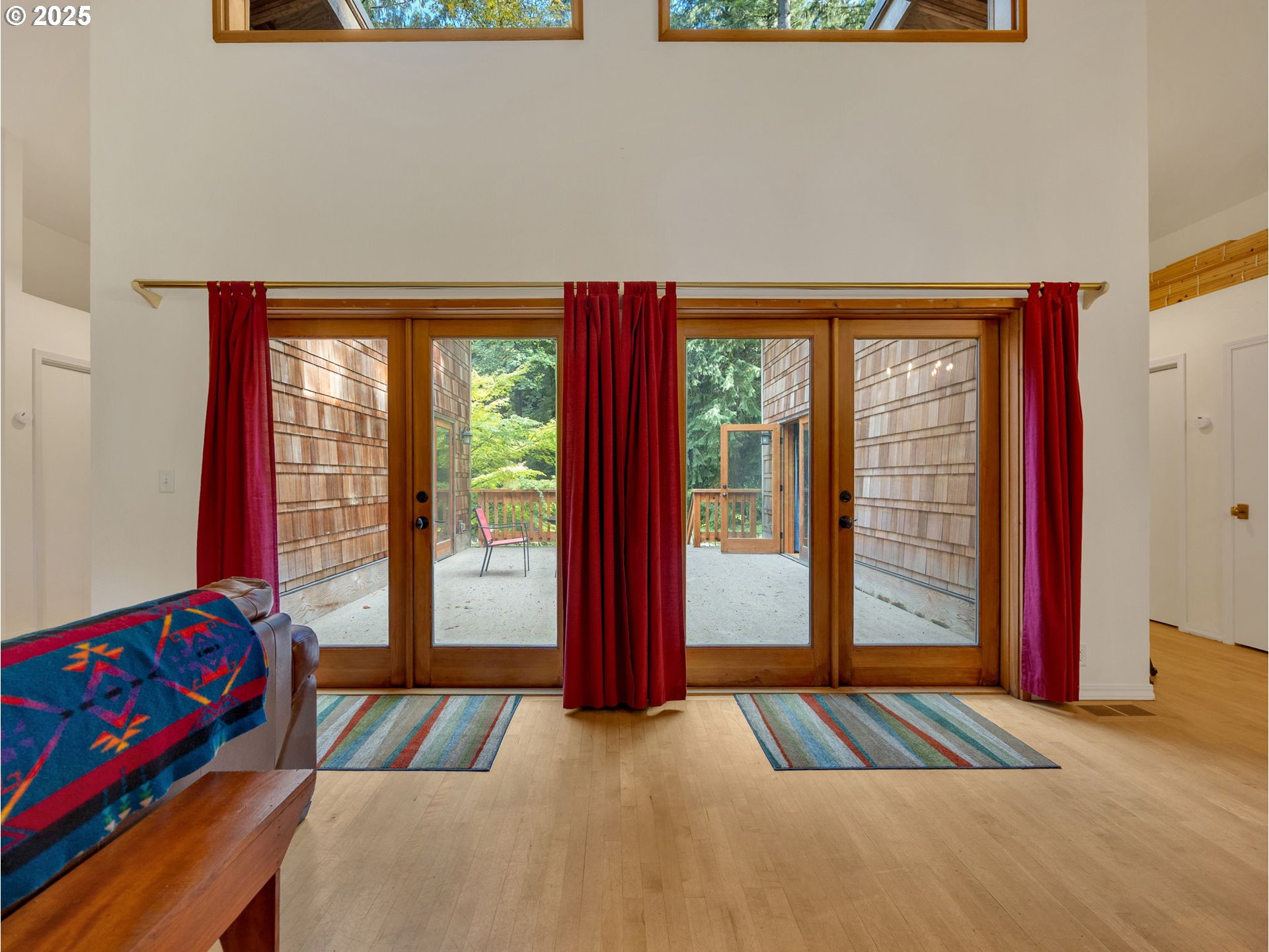 64079 East Barlow Trail Road Rhododendron, OR 97049 - Photo 9 of 48 a view of a bedroom with furniture and staircase