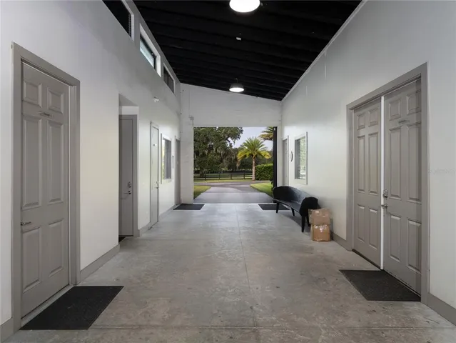 a kitchen with stainless steel appliances a stove and a microwave