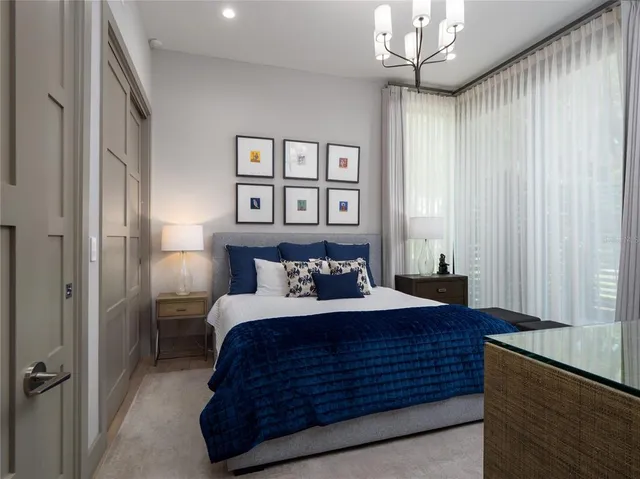 a view of a swimming pool with a bench