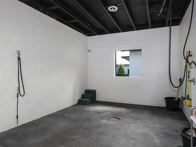 a front view of a house with yard and green space