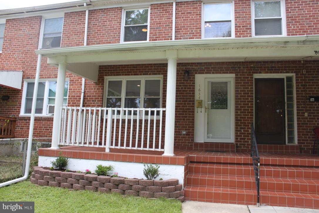 1654 Riverwood Road Baltimore, MD 21221 - Photo 1 of 30 a front view of a house