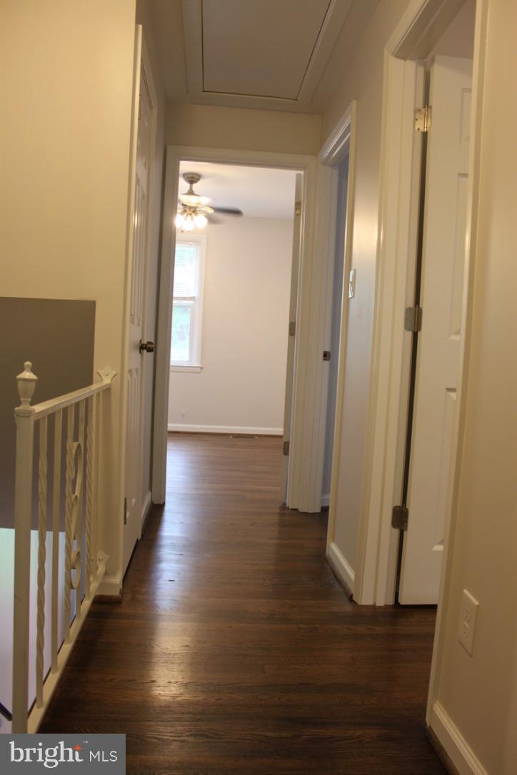 1654 Riverwood Road Baltimore, MD 21221 - Photo 13 of 30 a view of a hallway with wooden floor
