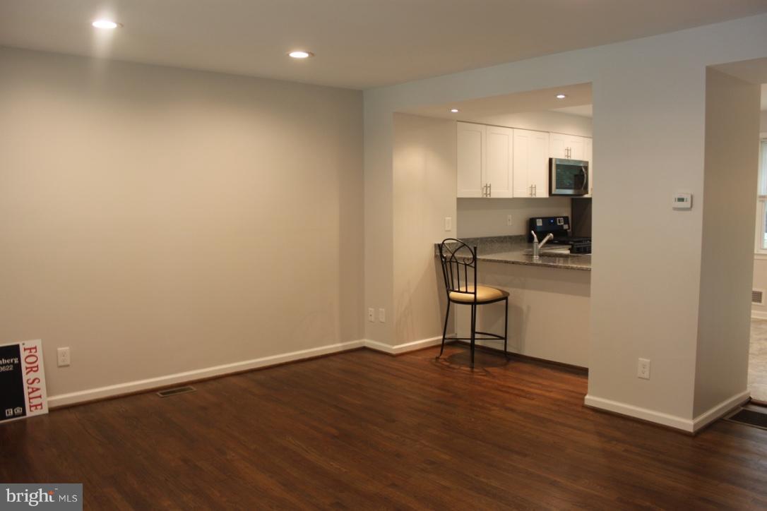 1654 Riverwood Road Baltimore, MD 21221 - Photo 3 of 30 a view of workspace with wooden floor