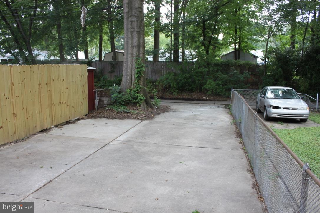 1654 Riverwood Road Baltimore, MD 21221 - Photo 24 of 30 a view of a car park in front of a house