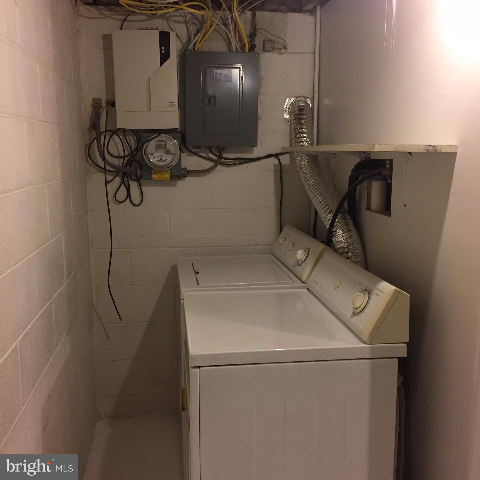 1654 Riverwood Road Baltimore, MD 21221 - Photo 30 of 30 a utility room with dryer and washer