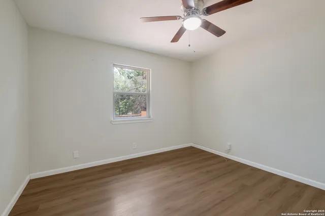 a kitchen with a sink and a refrigerator