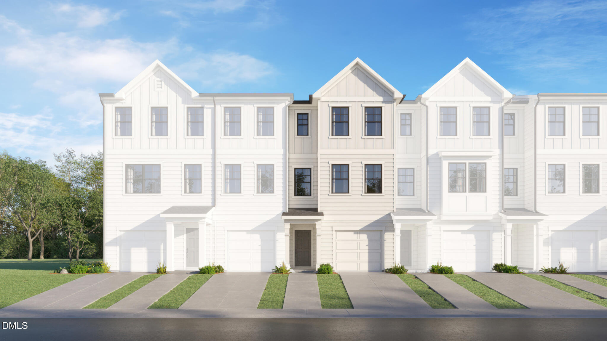 a front view of a residential houses with yard and parking