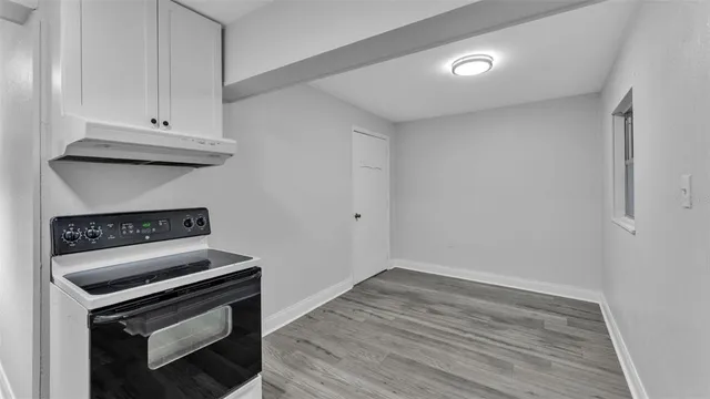 a view of kitchen with stove