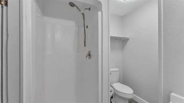 a house with trees in the background