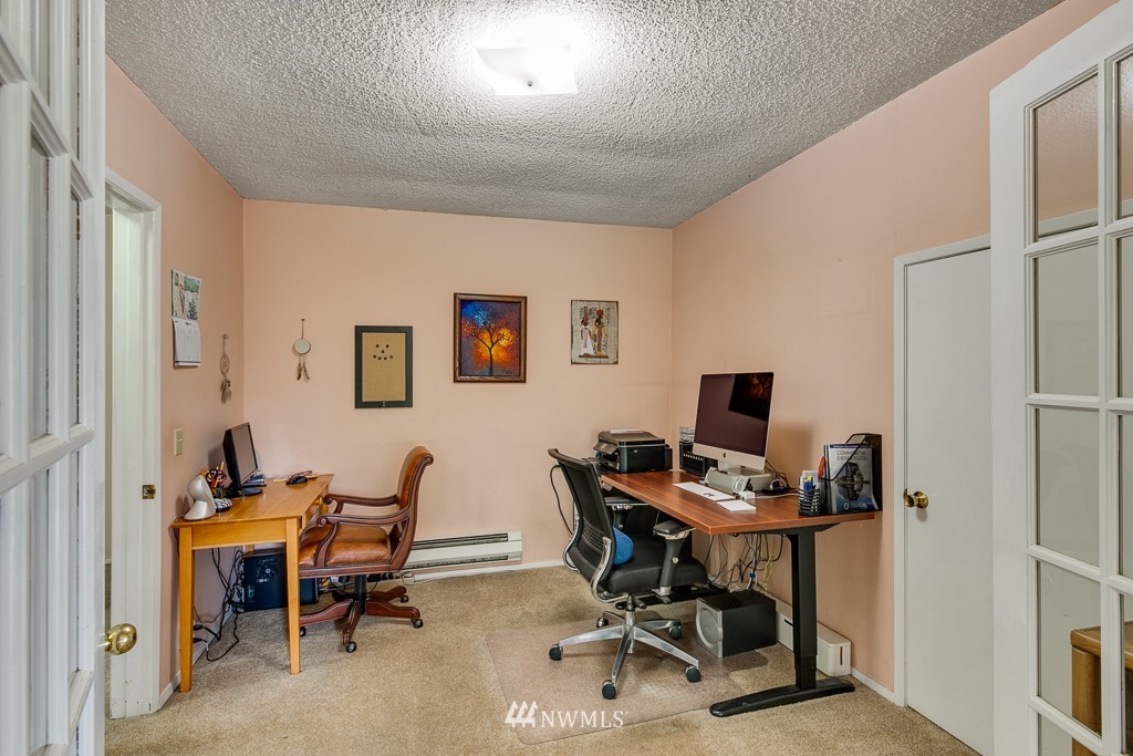 7404 Lower Ridge Road Everett, WA 98203 - Photo 9 of 33 a view of a workspace with furniture and a workspace