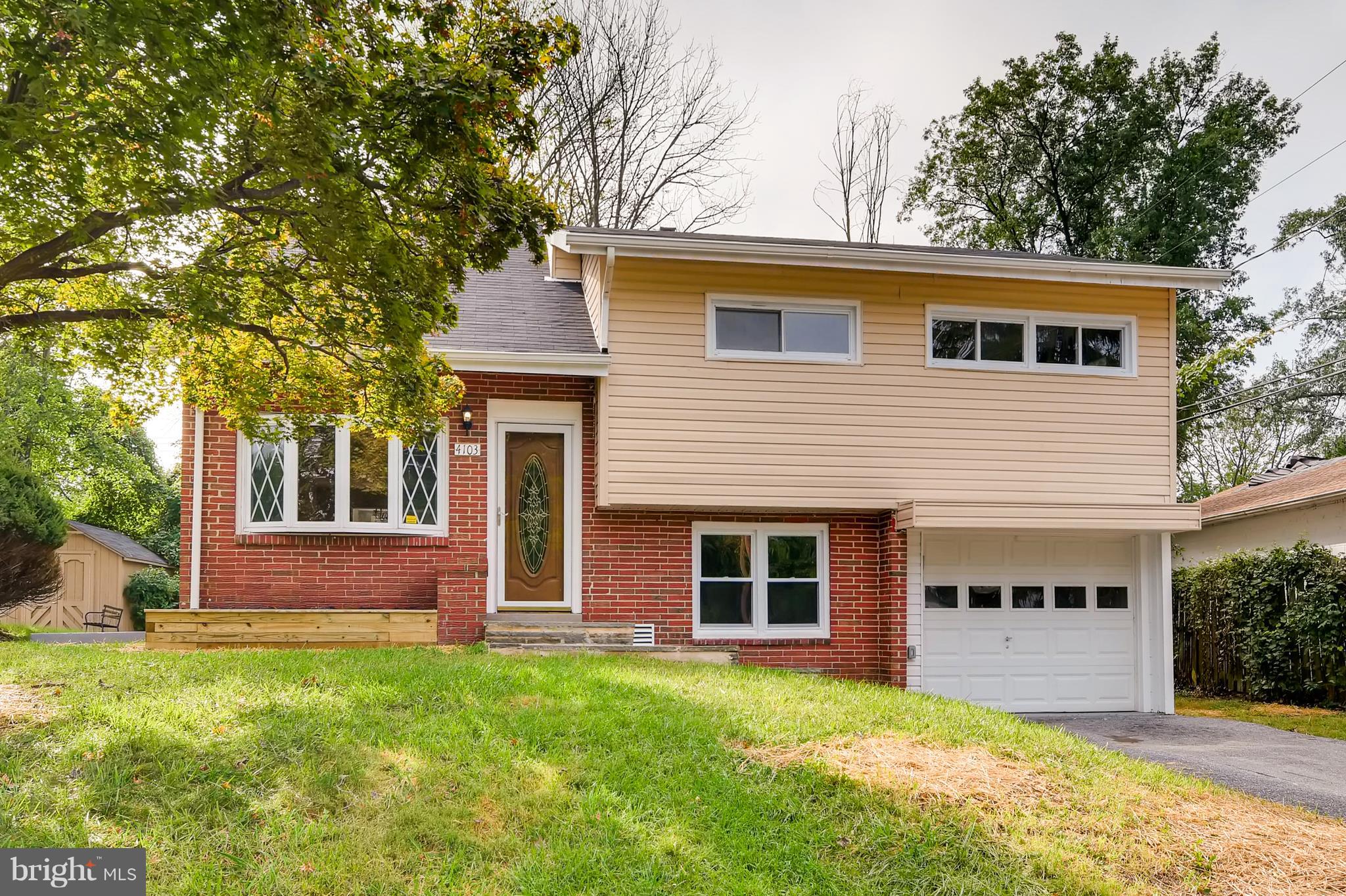 4103 Ronis Road Baltimore, MD 21208 - Photo 1 of 22 a view of front of a house with a yard