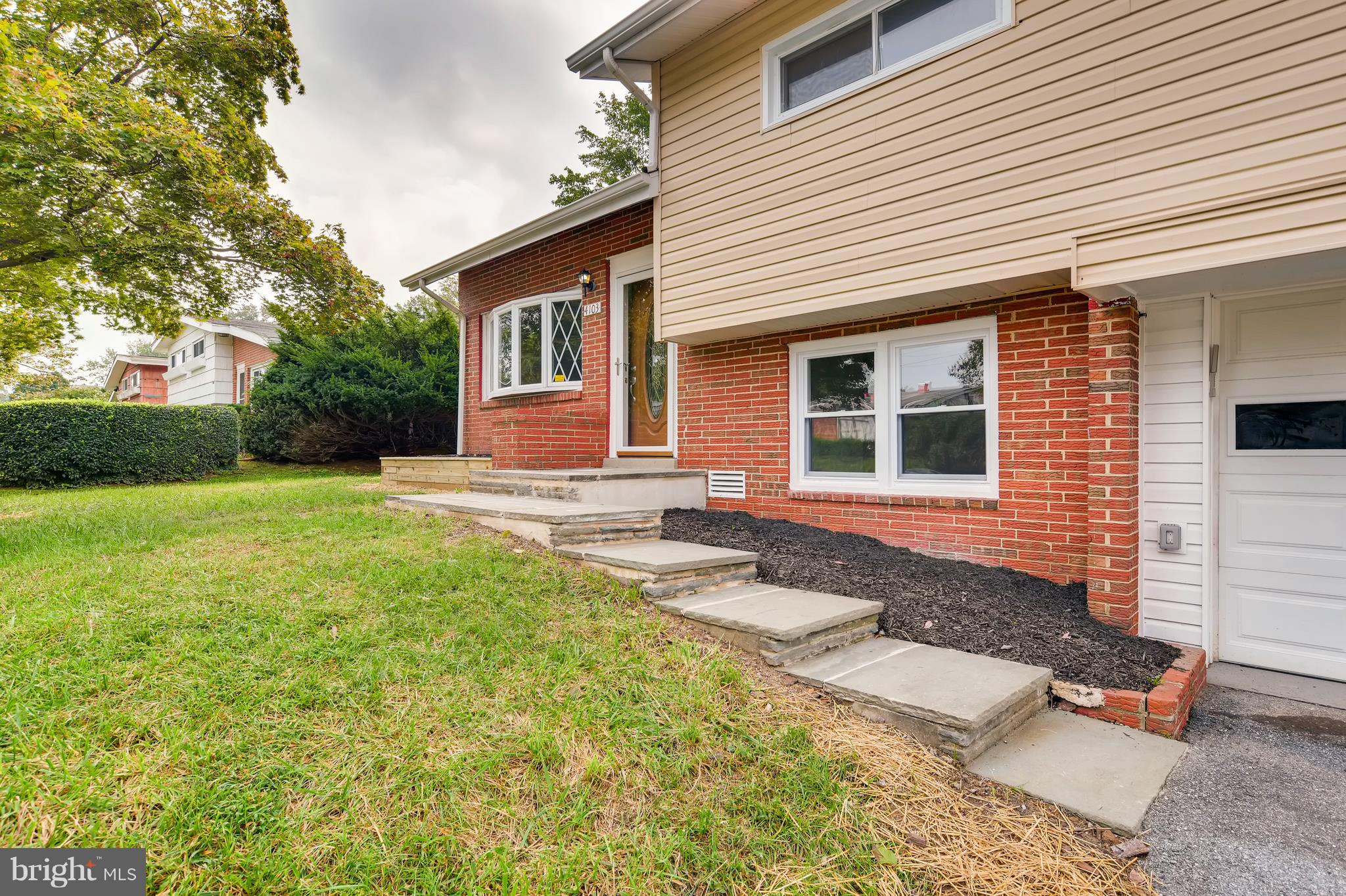 4103 Ronis Road Baltimore, MD 21208 - Photo 3 of 22 a front view of a house with yard
