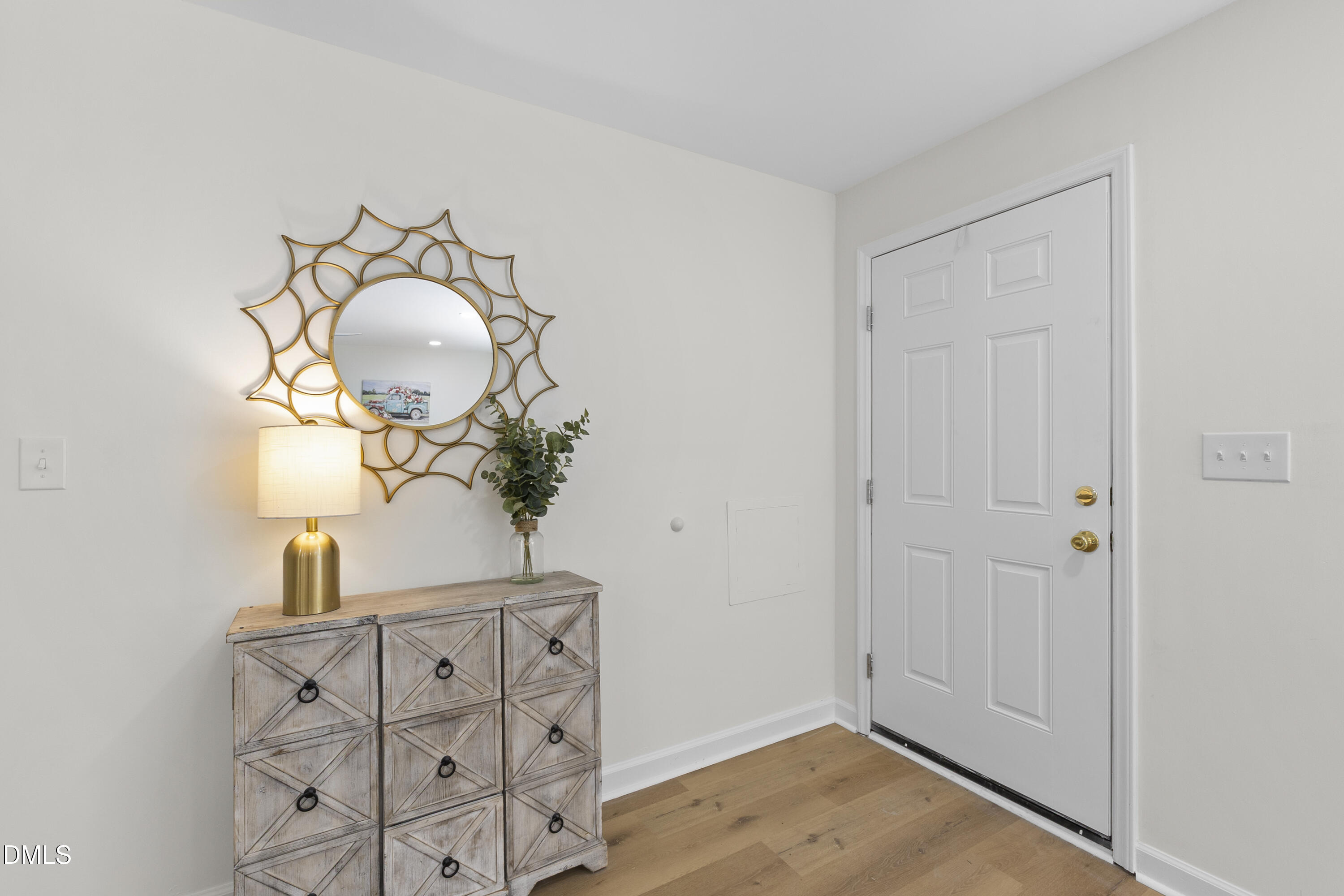 2168 Lakewood Falls Road Goldston, NC 27252 - Photo 7 of 30 a view of entryway with wooden floor