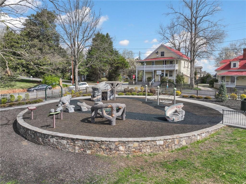 49 Old Stamp Mill Road Dahlonega, GA 30533 - Photo 19 of 35 a view of a swimming pool with outdoor seating