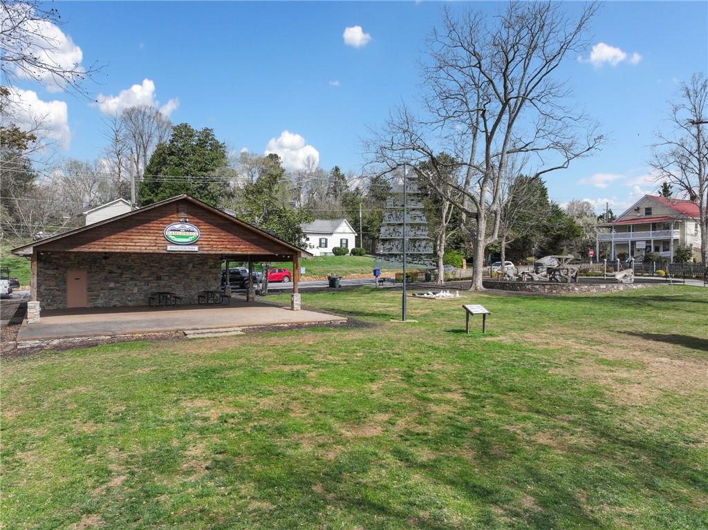 49 Old Stamp Mill Road Dahlonega, GA 30533 - Photo 20 of 35 a view of a house with swimming pool and a yard