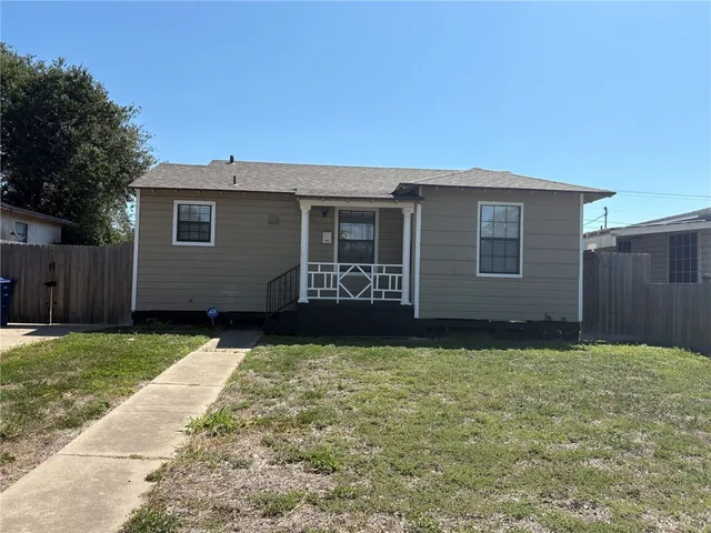 a view of a backyard with a garden