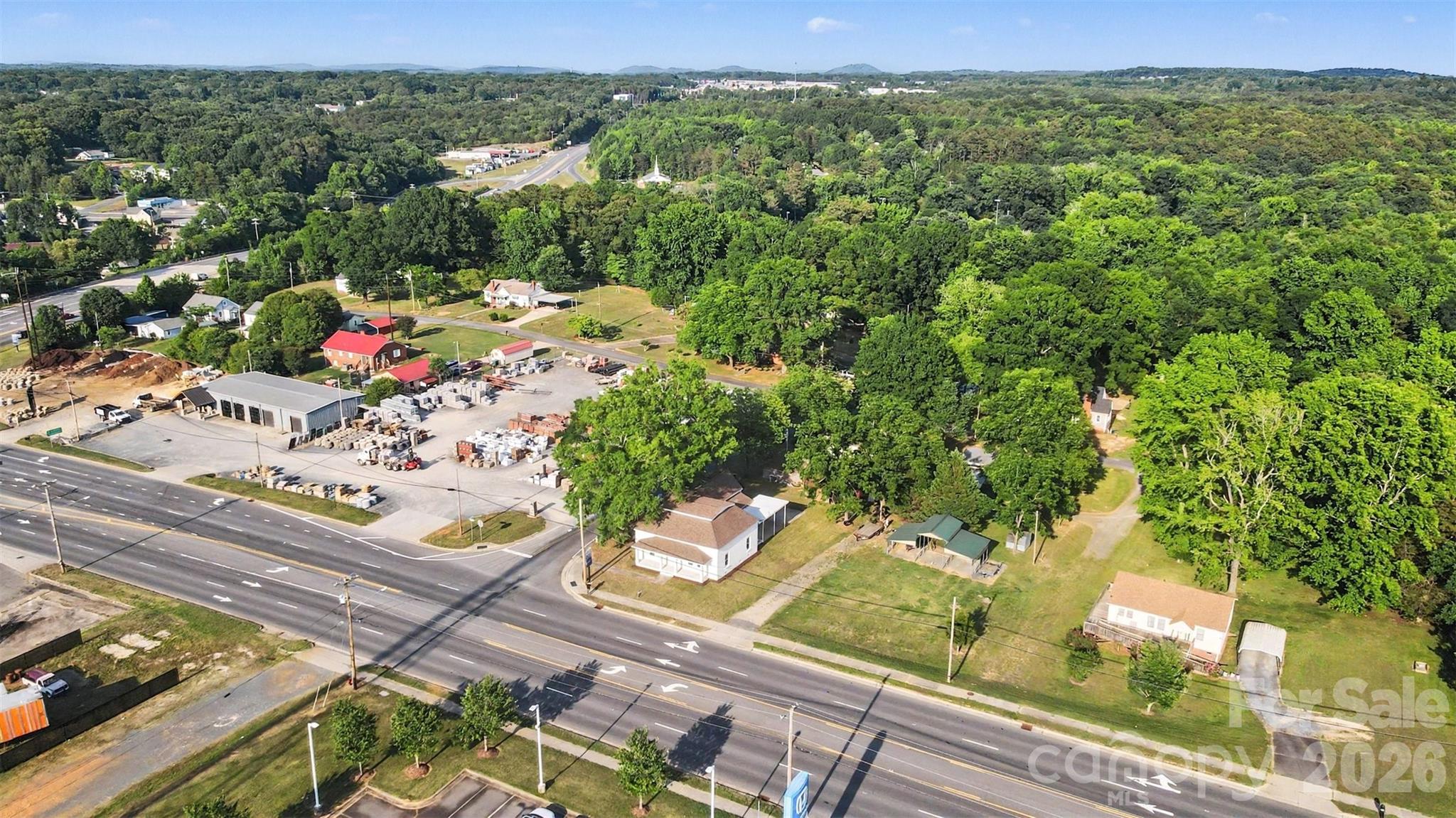 405 Aquadale Road Albemarle, NC 28001 - Photo 28 of 29 an aerial view of residential houses with outdoor space