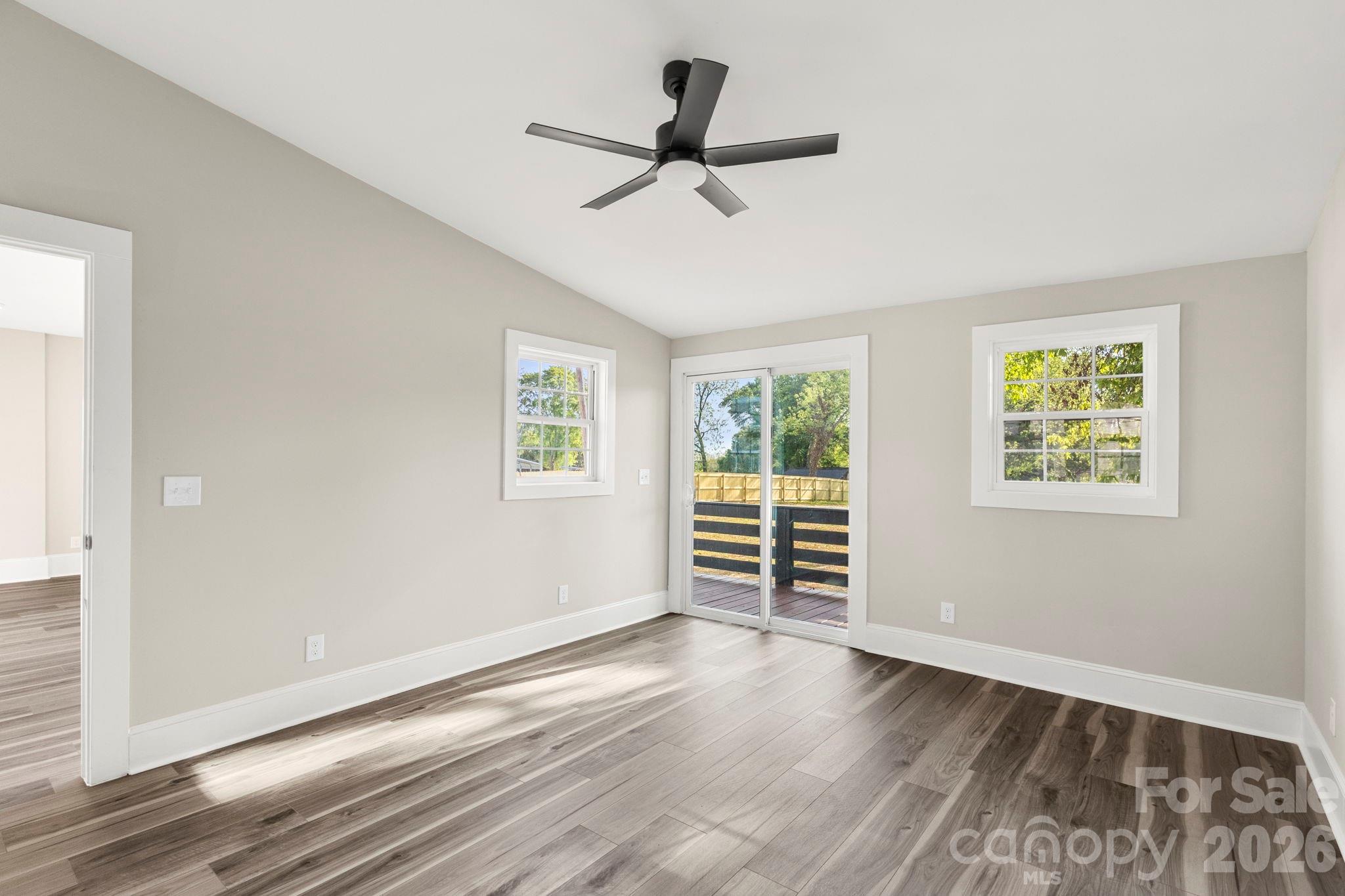 918 North New Hope Road Gastonia, NC 28054 - Photo 21 of 37 wooden floor in an empty room with a window