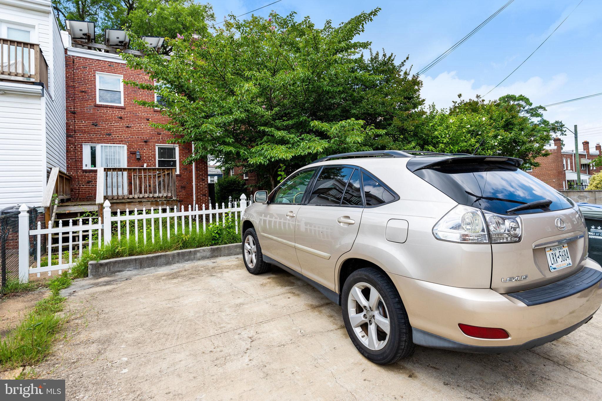 4627 12th Street Northeast Washington, DC 20017 - Photo 11 of 56 a view of a car parked in front of a house