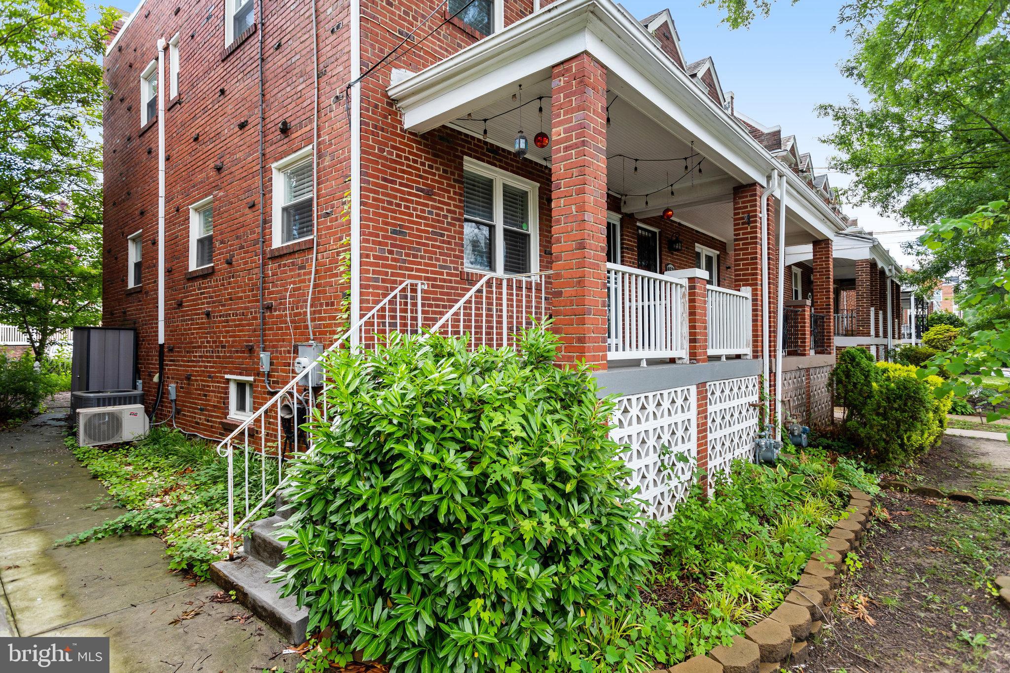 4627 12th Street Northeast Washington, DC 20017 - Photo 2 of 56 front view of a house with a yard