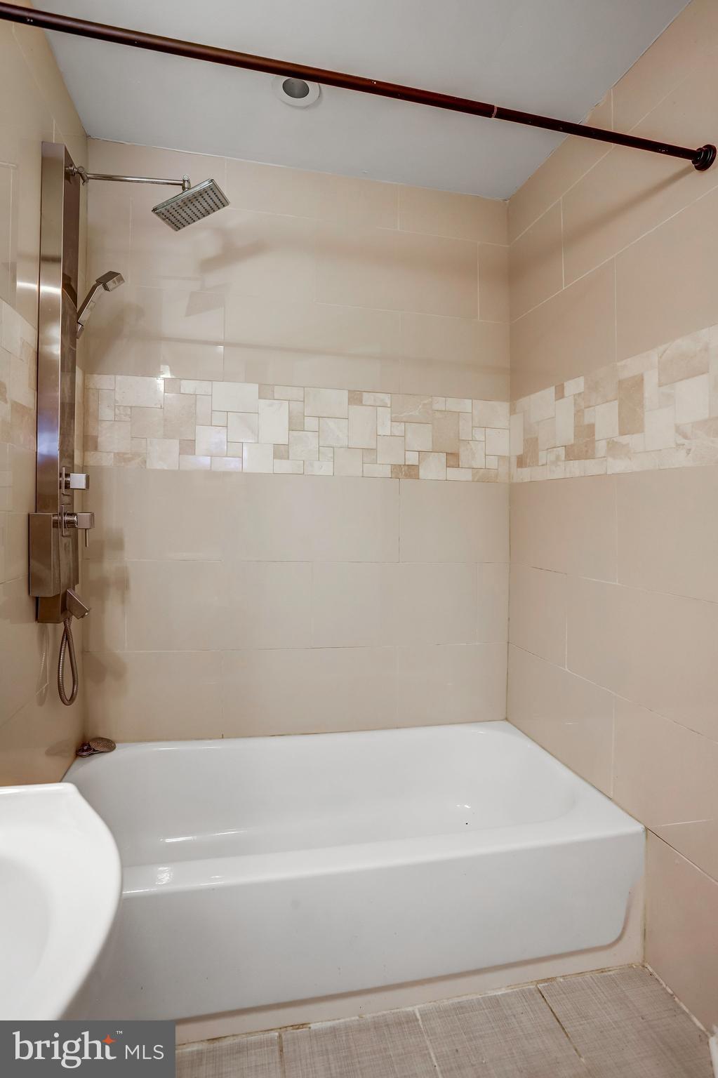 4627 12th Street Northeast Washington, DC 20017 - Photo 26 of 56 a bathroom with a shower and a toilet