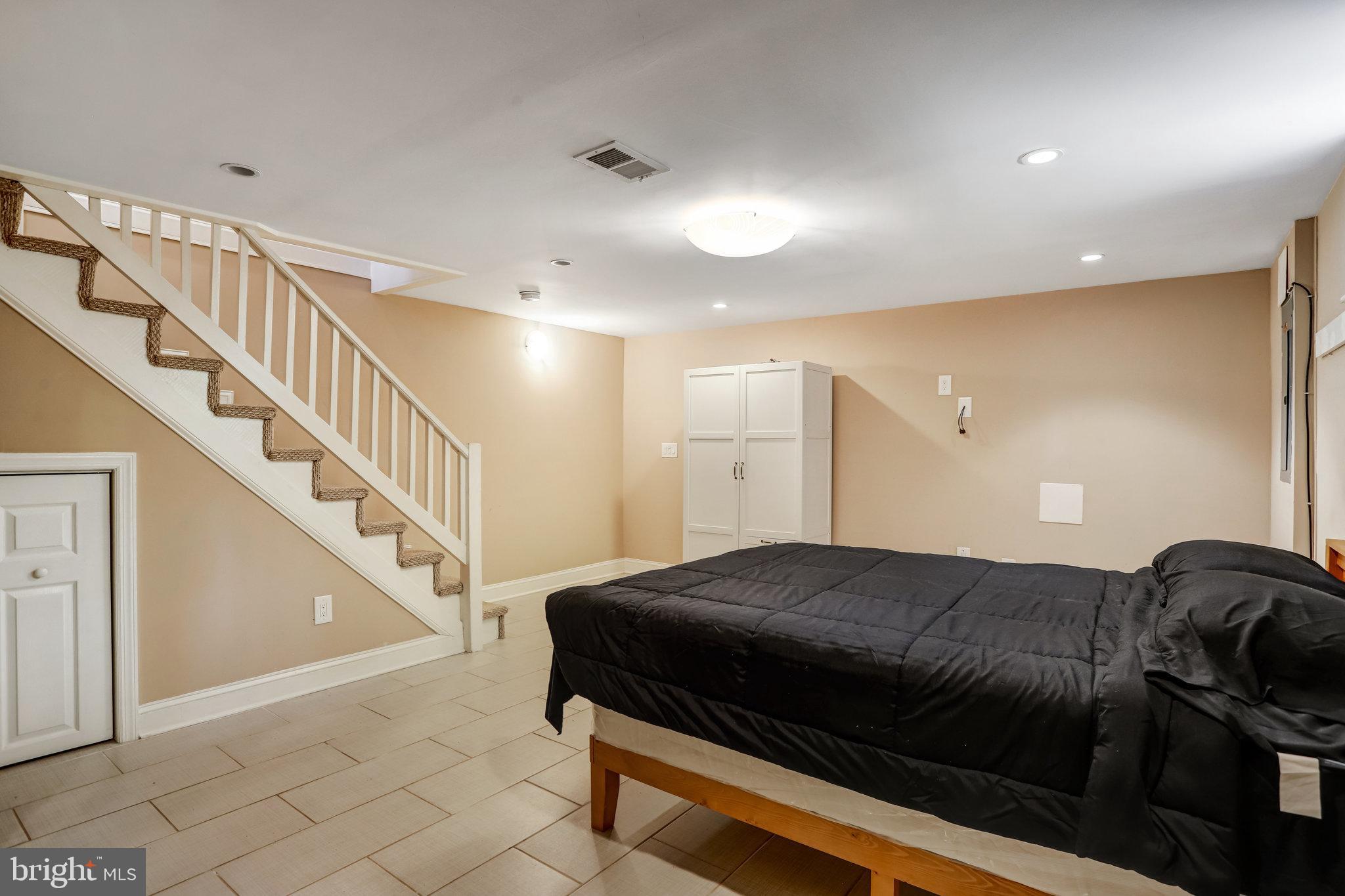 4627 12th Street Northeast Washington, DC 20017 - Photo 29 of 56 a view of bedroom and hall with wooden floor
