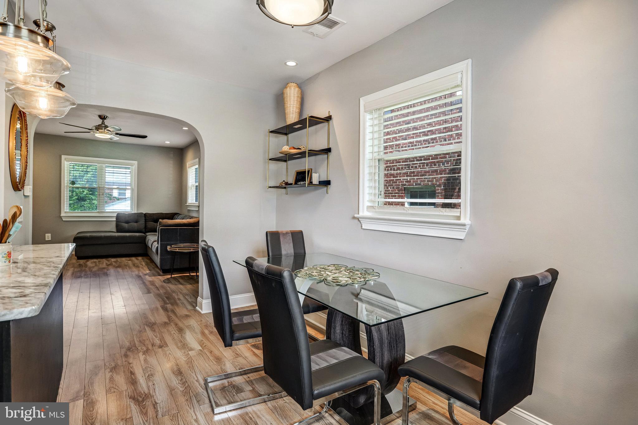 4627 12th Street Northeast Washington, DC 20017 - Photo 36 of 56 a view of a dining room with furniture window and wooden floor