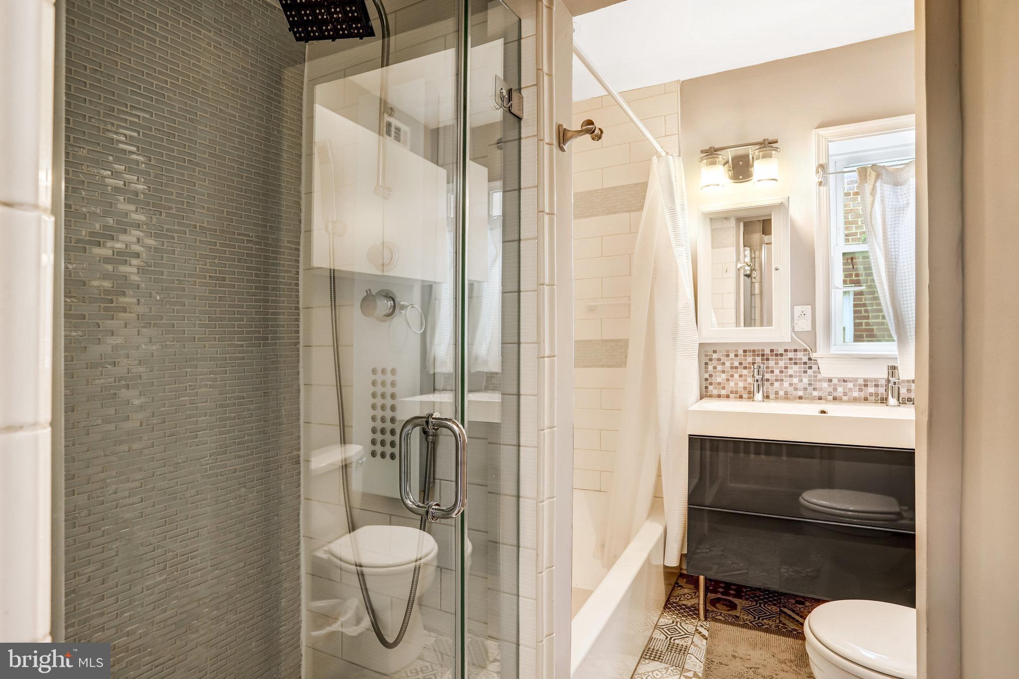 4627 12th Street Northeast Washington, DC 20017 - Photo 39 of 56 a bathroom with a sink toilet and shower