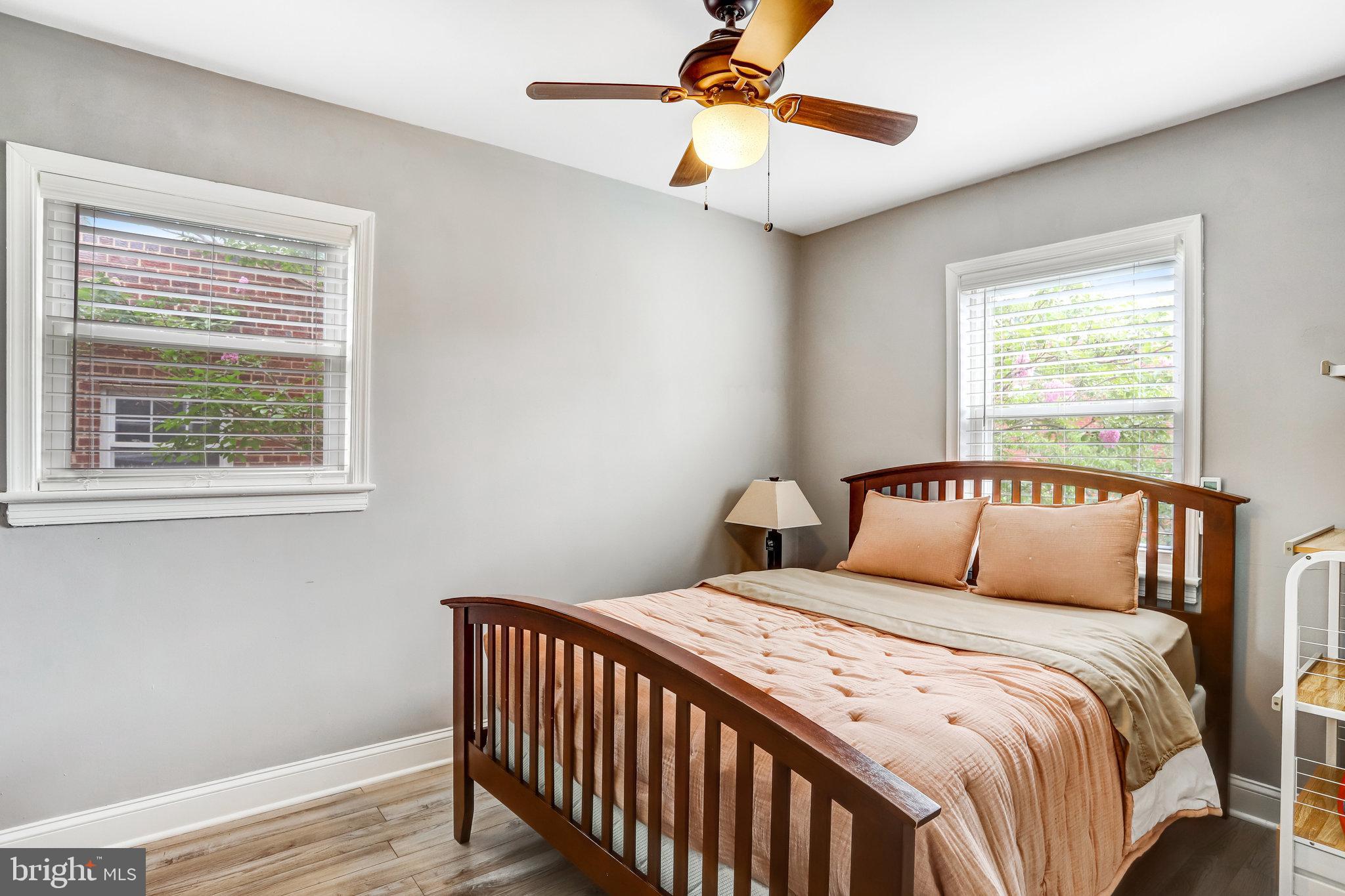 4627 12th Street Northeast Washington, DC 20017 - Photo 40 of 56 a bedroom with a large bed and a window