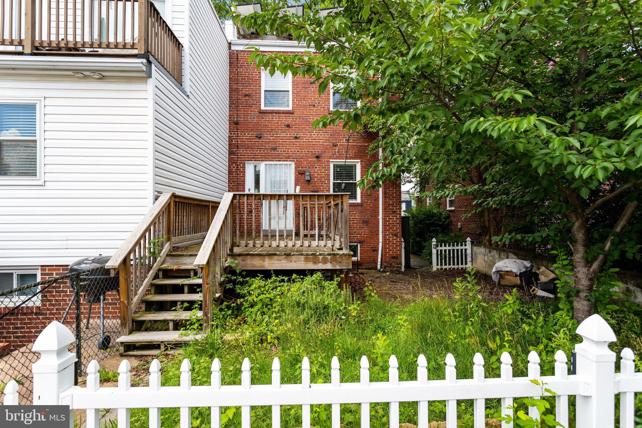 4627 12th Street Northeast Washington, DC 20017 - Photo 4 of 56 a front view of a house with a yard