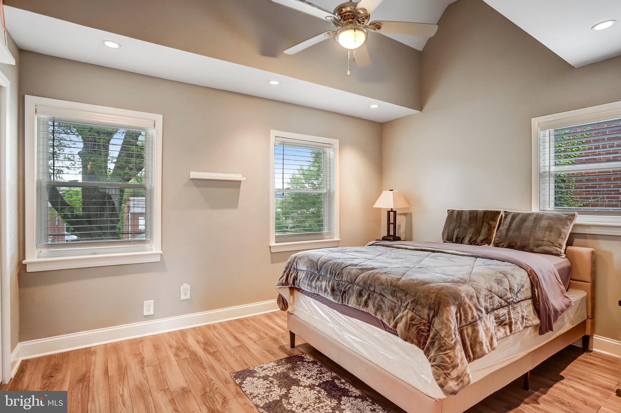 4627 12th Street Northeast Washington, DC 20017 - Photo 42 of 56 a bedroom with a large bed and a window