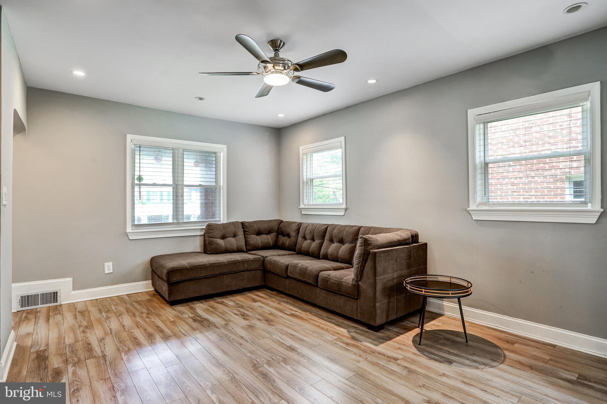 4627 12th Street Northeast Washington, DC 20017 - Photo 44 of 56 a living room with furniture and a window