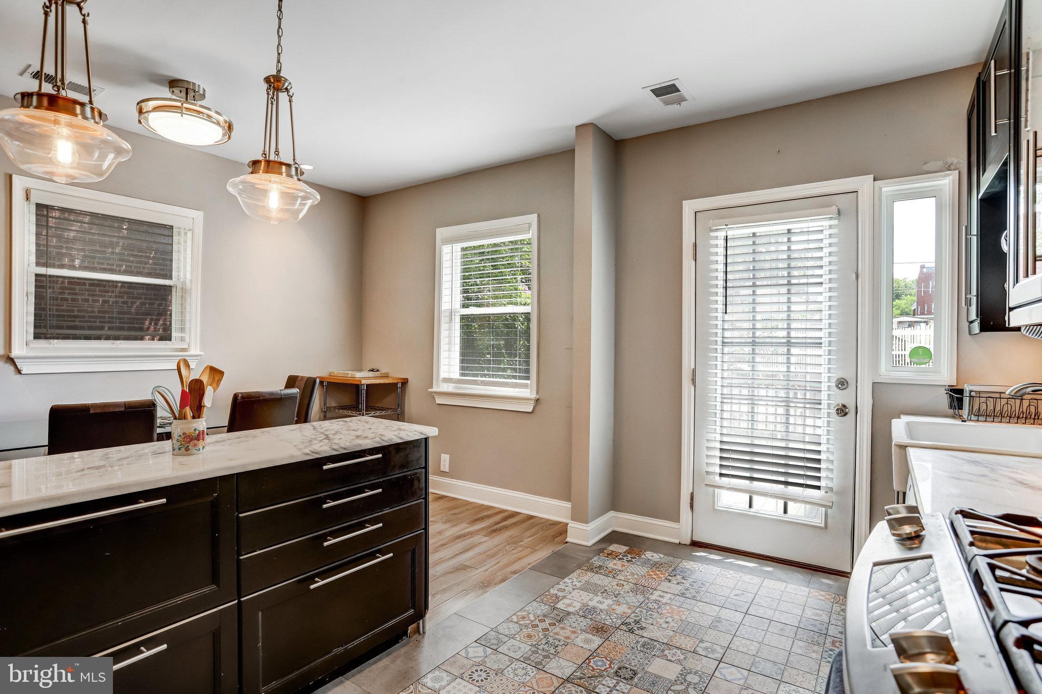 4627 12th Street Northeast Washington, DC 20017 - Photo 49 of 56 a bathroom with a sink a vanity and a mirror