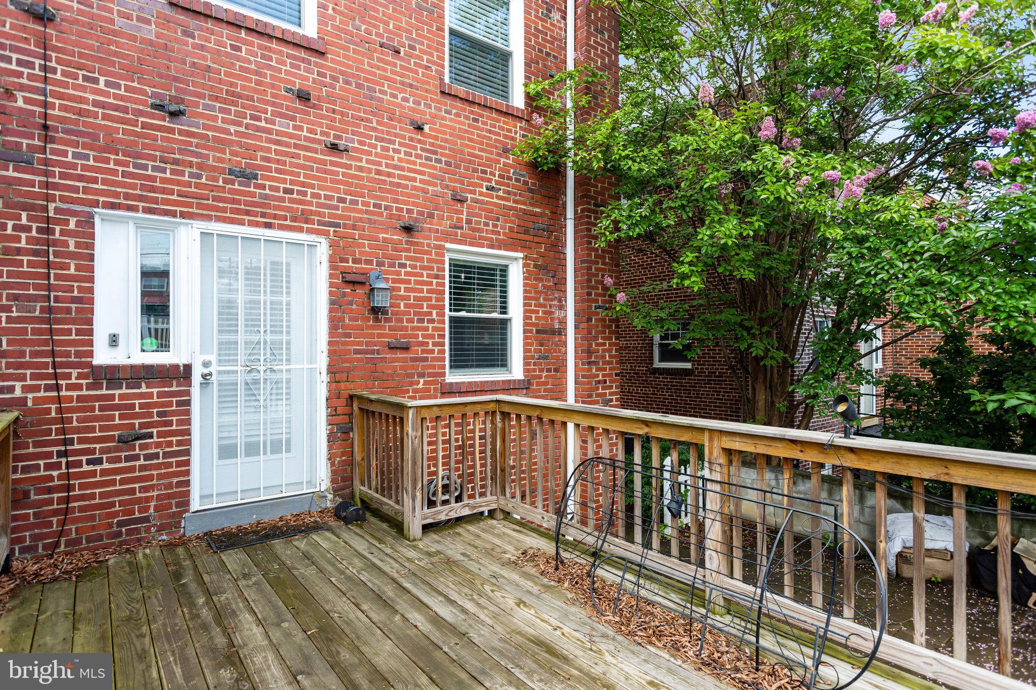4627 12th Street Northeast Washington, DC 20017 - Photo 8 of 56 a view of a brick house with a large window