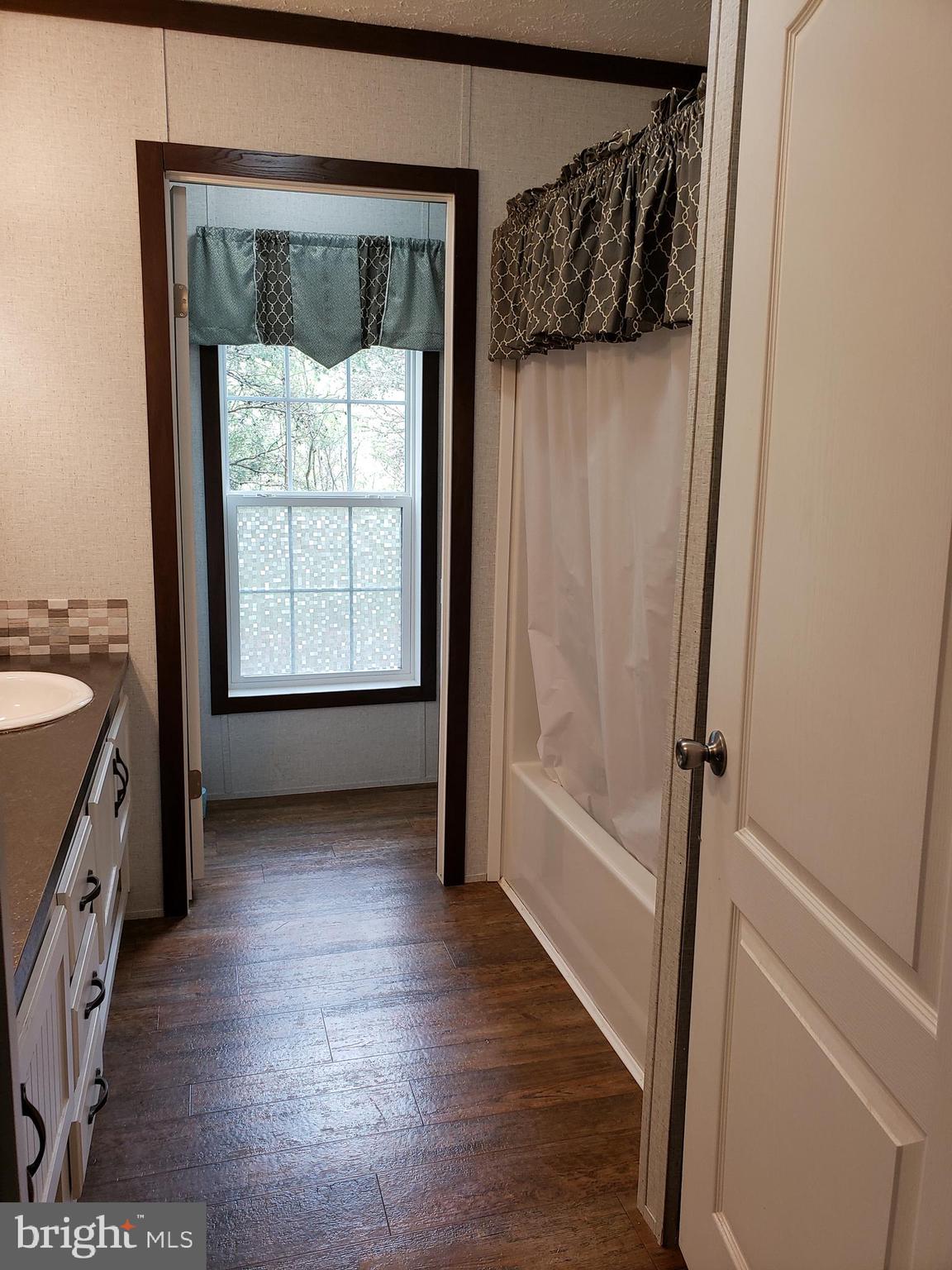 357 Packing House Road Berkeley Springs, WV 25411 - Photo 26 of 42 Main Hallway full bath