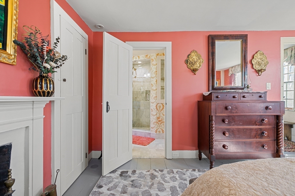 152 South Great Road Lincoln, MA 01773 - Photo 23 of 40 a bedroom with a bed and a dresser