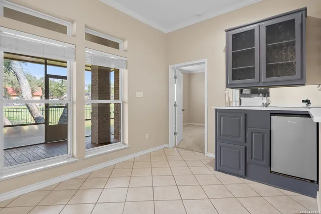 a view of a kitchen with windows