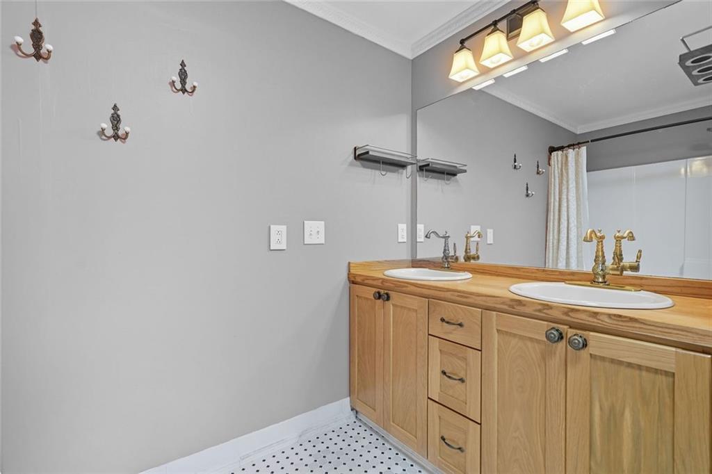 275 Old Whitestone Road West Talking Rock, GA 30175 - Photo 15 of 30 a spacious bathroom with a granite countertop sink a mirror and a vanity