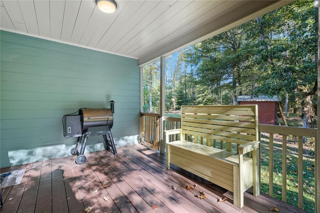 275 Old Whitestone Road West Talking Rock, GA 30175 - Photo 20 of 30 a view of a chairs and table in the balcony