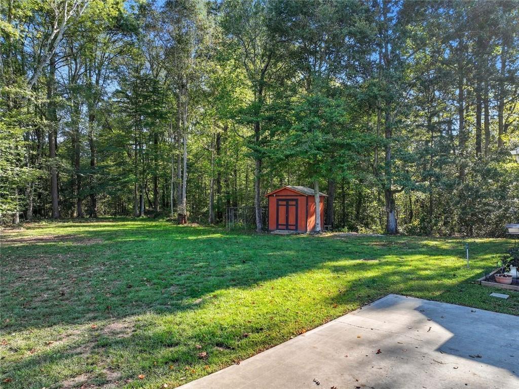275 Old Whitestone Road West Talking Rock, GA 30175 - Photo 21 of 30 a view of a park with large trees