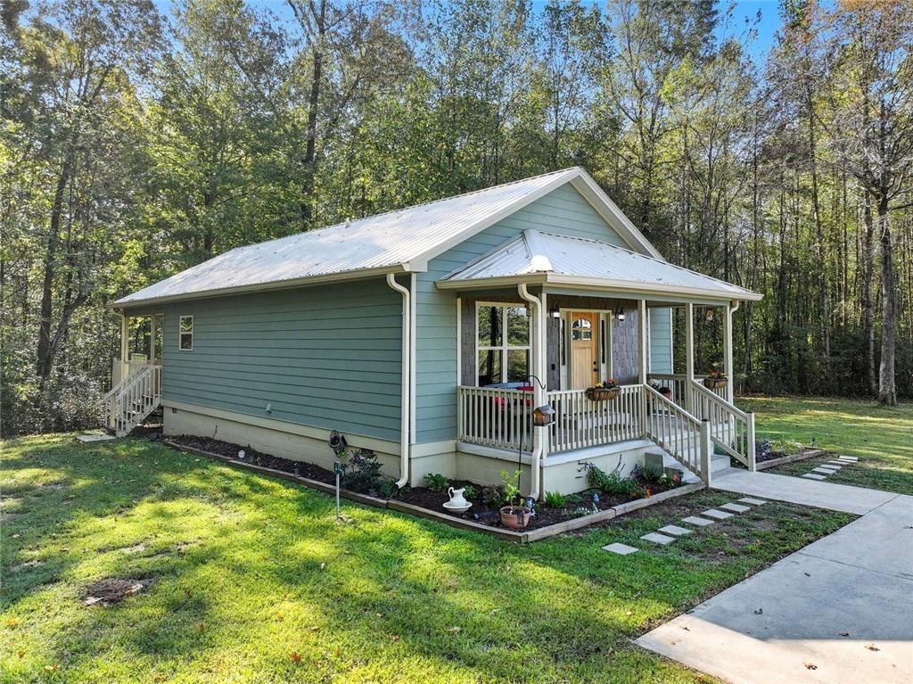 275 Old Whitestone Road West Talking Rock, GA 30175 - Photo 23 of 30 a view of a house with backyard porch and sitting area