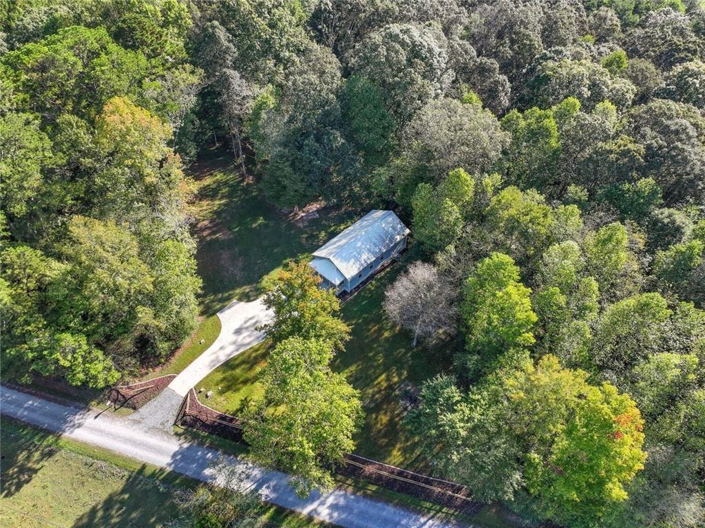 275 Old Whitestone Road West Talking Rock, GA 30175 - Photo 25 of 30 an aerial view of a house with a yard